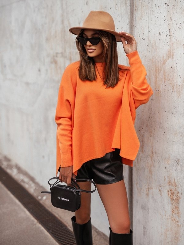 Oversized sweater with slits.