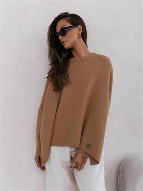 Oversized sweater with slits.