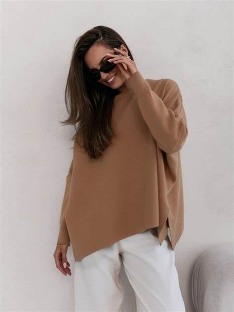 Oversized sweater with slits.